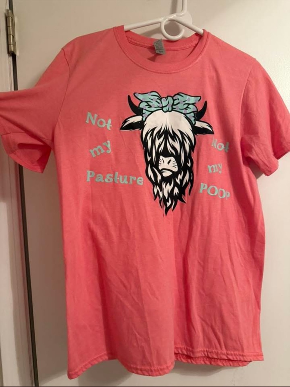 Girls' Coral Graphic Tee with Cow Print and Bow
